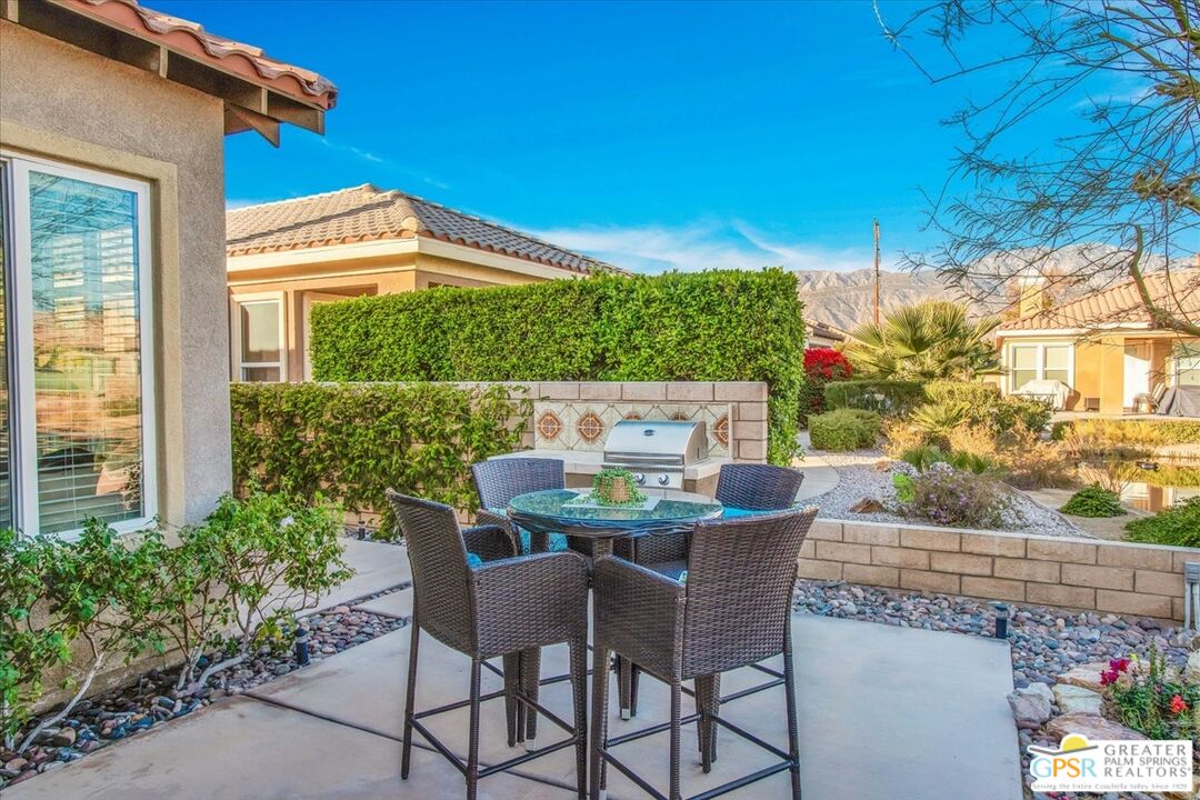 8 Lake Como Court Rancho Mirage, CA 92270 - Photo 36 of 63 a view of an outdoor dining space with a table and chairs