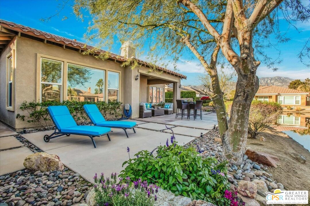 8 Lake Como Court Rancho Mirage, CA 92270 - Photo 41 of 63 a view of a patio with table and chairs and potted plants