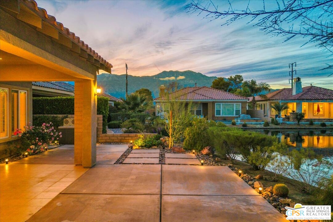8 Lake Como Court Rancho Mirage, CA 92270 - Photo 48 of 63 a front view of a house with a lake view