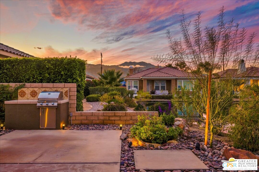 8 Lake Como Court Rancho Mirage, CA 92270 - Photo 49 of 63 a front view of a house with a yard