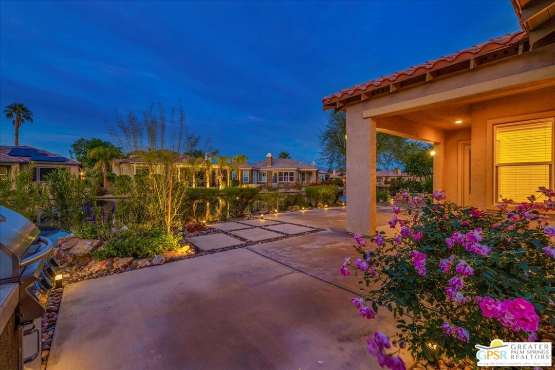 8 Lake Como Court Rancho Mirage, CA 92270 - Photo 51 of 63 a view of a house with potted plants
