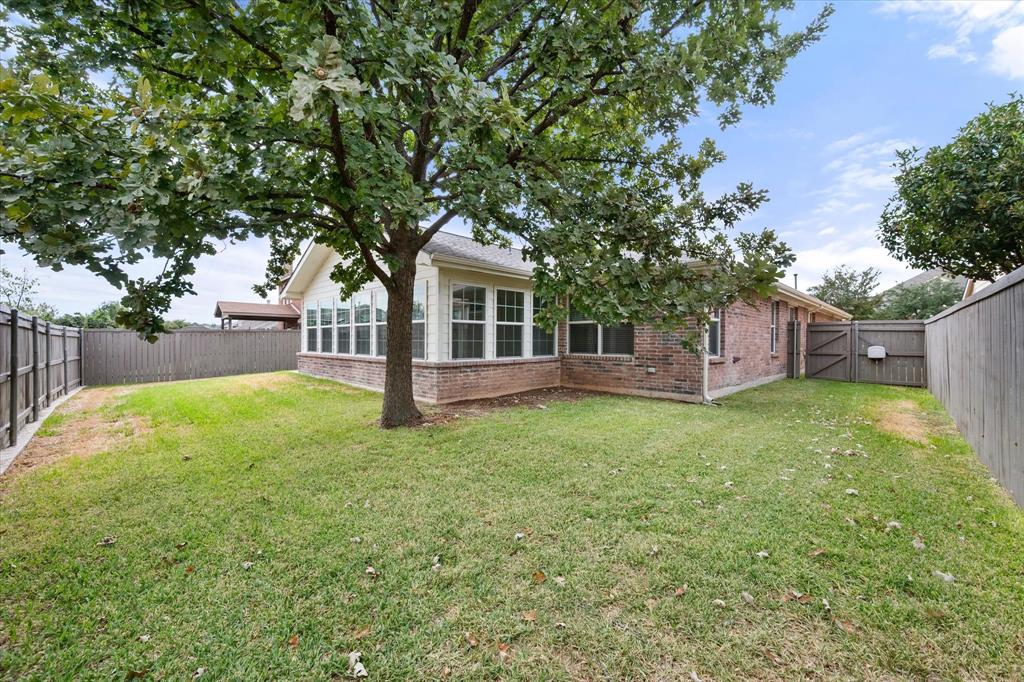 1109 Nighthawk Road Fort Worth, TX 76108 - Photo 19 of 23 Private backyard with plenty of space for family to play and pets to roam
