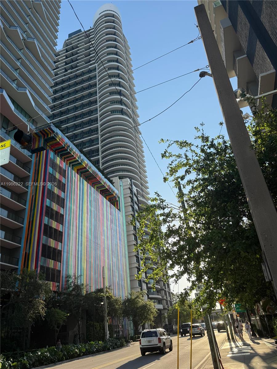 60 Southwest 13th Street, Unit 3017 Miami, FL 33130 - Photo 2 of 46 a couple of cars parked in front of buildings