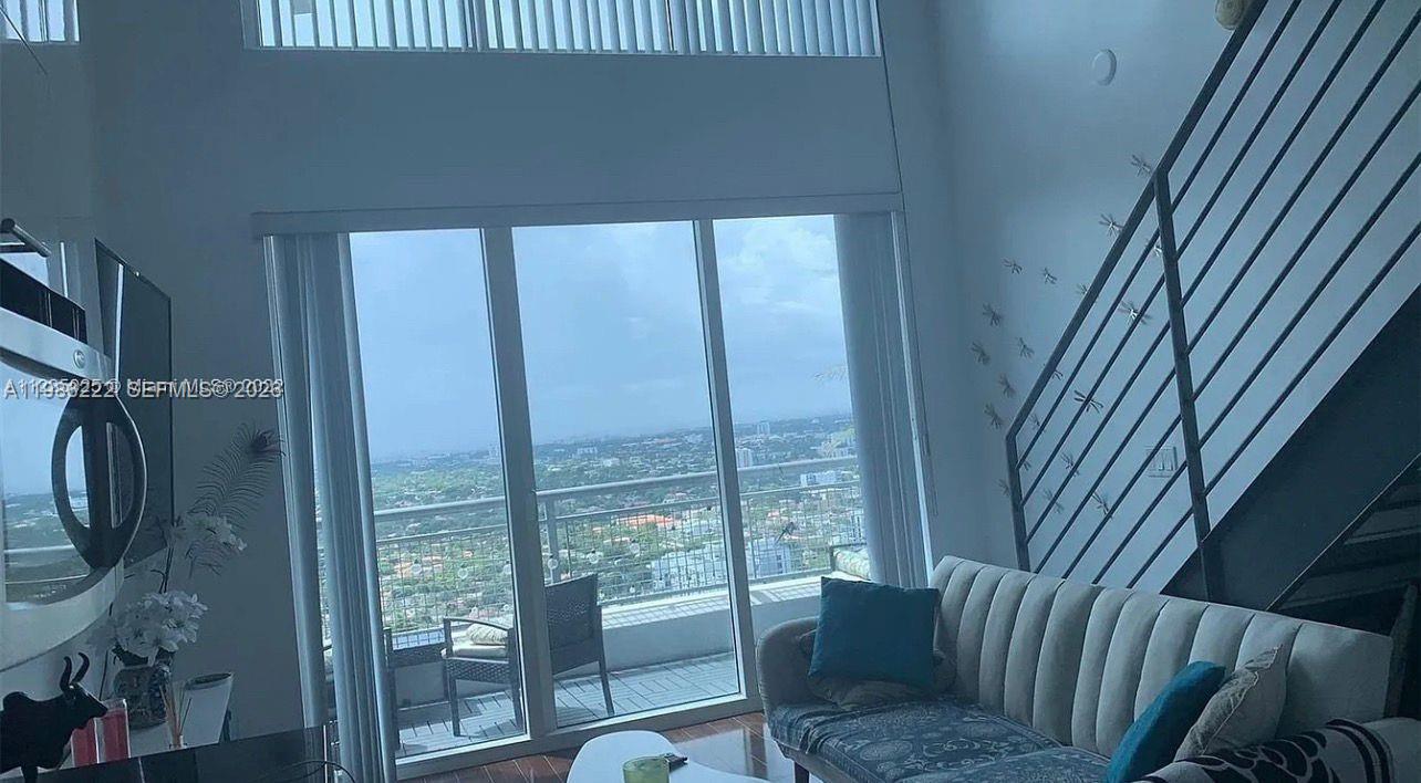 60 Southwest 13th Street, Unit 3017 Miami, FL 33130 - Photo 24 of 46 a balcony view with a couch