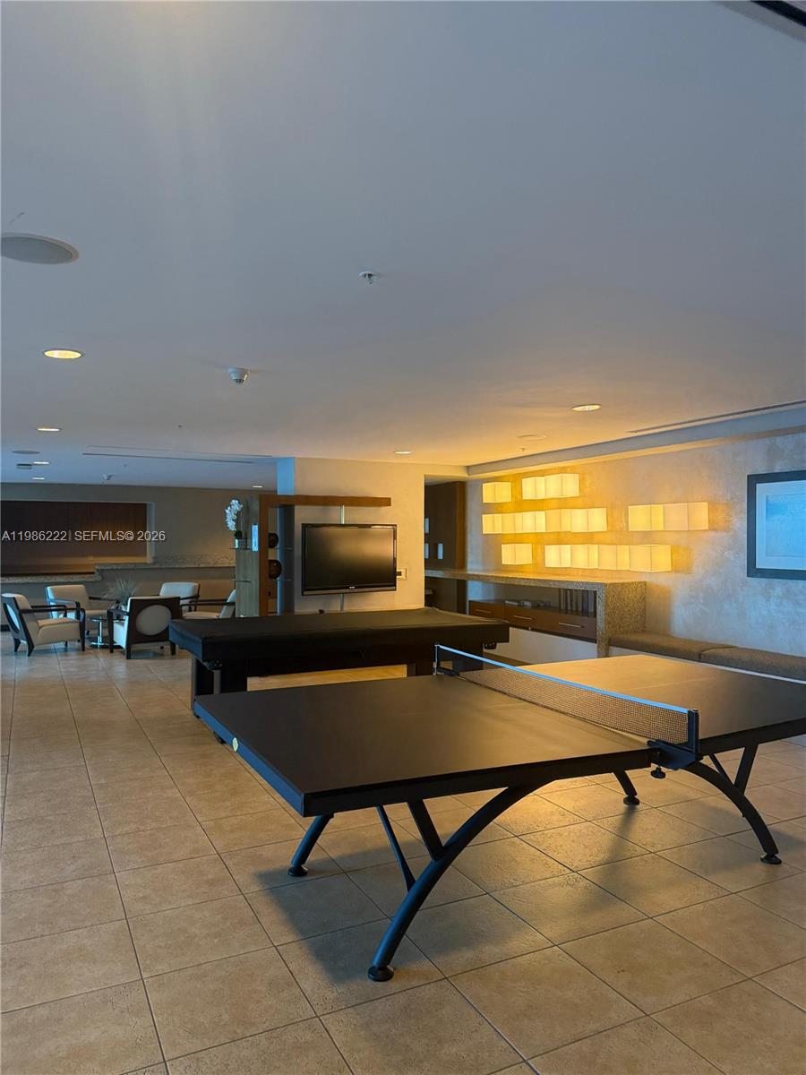 60 Southwest 13th Street, Unit 3017 Miami, FL 33130 - Photo 28 of 46 a room with furniture pool table and flat screen tv