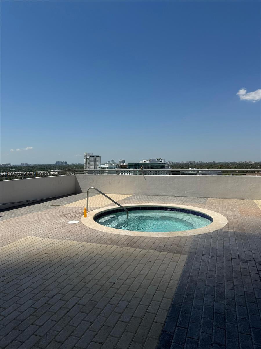 60 Southwest 13th Street, Unit 3017 Miami, FL 33130 - Photo 29 of 46 a view of a swimming pool and an outdoor space