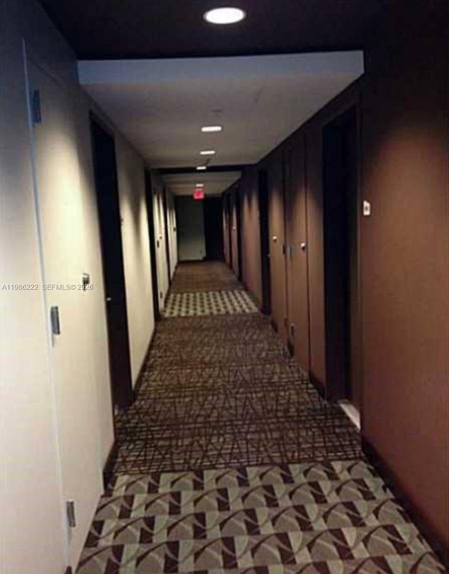 60 Southwest 13th Street, Unit 3017 Miami, FL 33130 - Photo 45 of 46 a view of a hallway