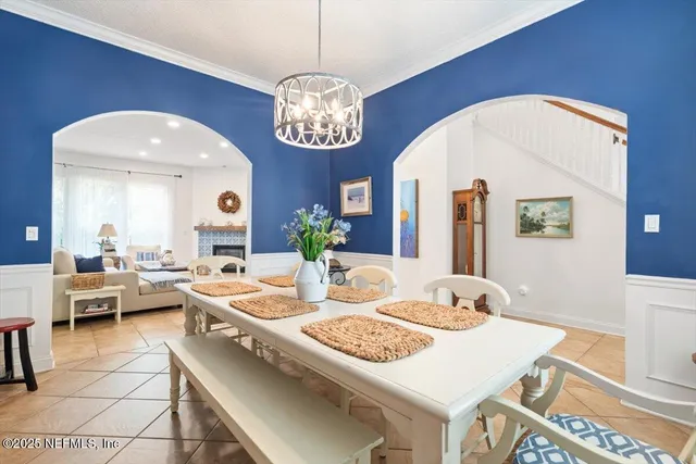 an aerial view of a house with outdoor space and street view