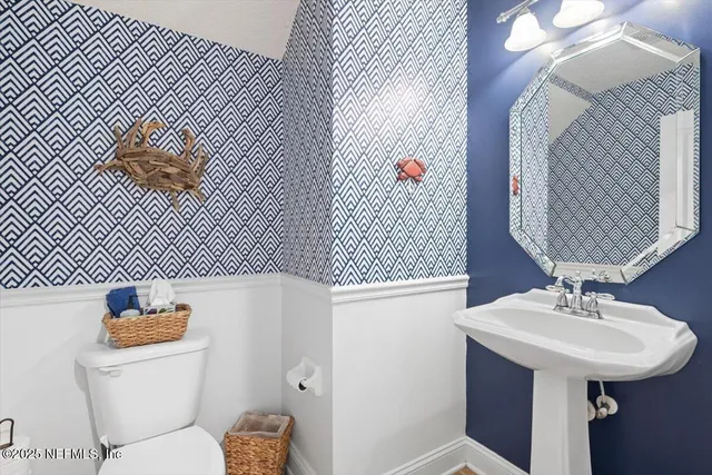 an aerial view of a house with outdoor space