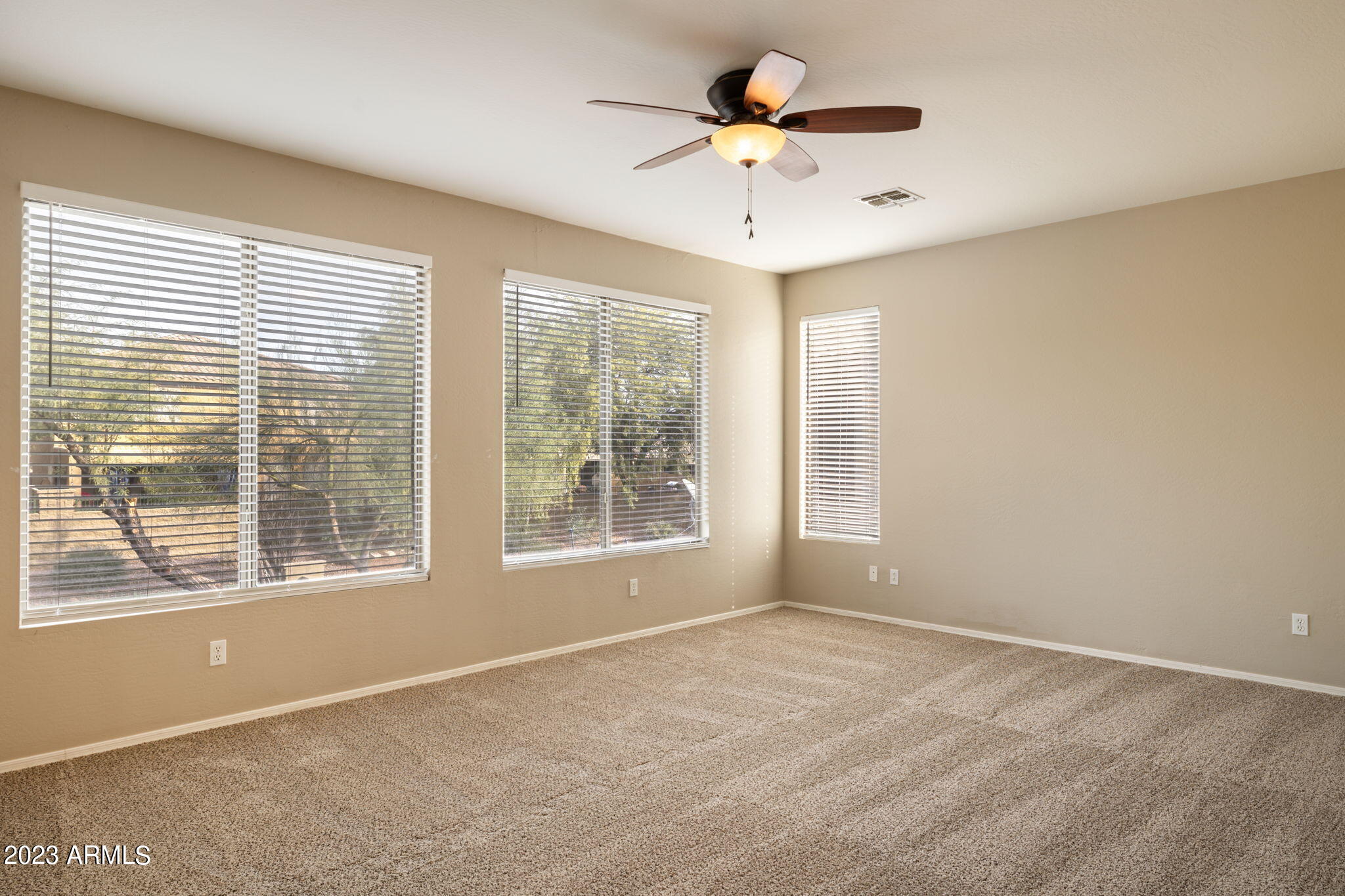 3338 West Hemingway Lane Phoenix, AZ 85086 - Photo 24 of 48 a view of an empty room with a window