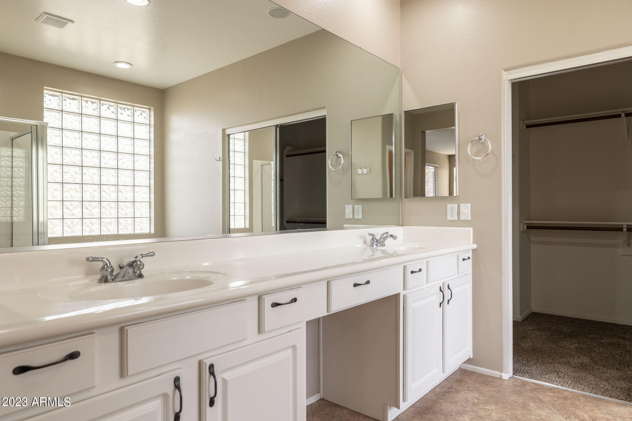3338 West Hemingway Lane Phoenix, AZ 85086 - Photo 28 of 48 a bathroom with a double vanity sink mirror and double