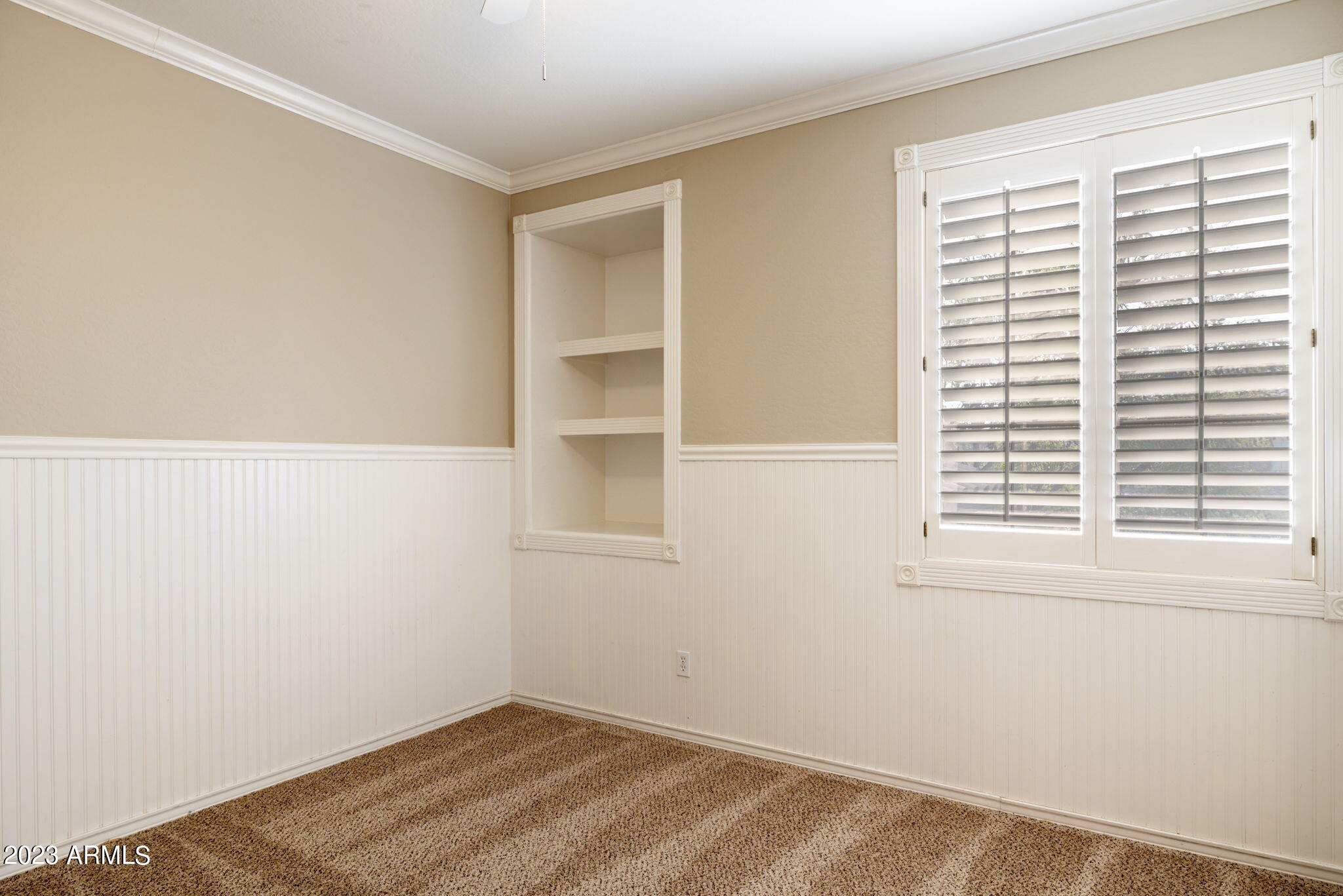 3338 West Hemingway Lane Phoenix, AZ 85086 - Photo 37 of 48 an empty room with a window