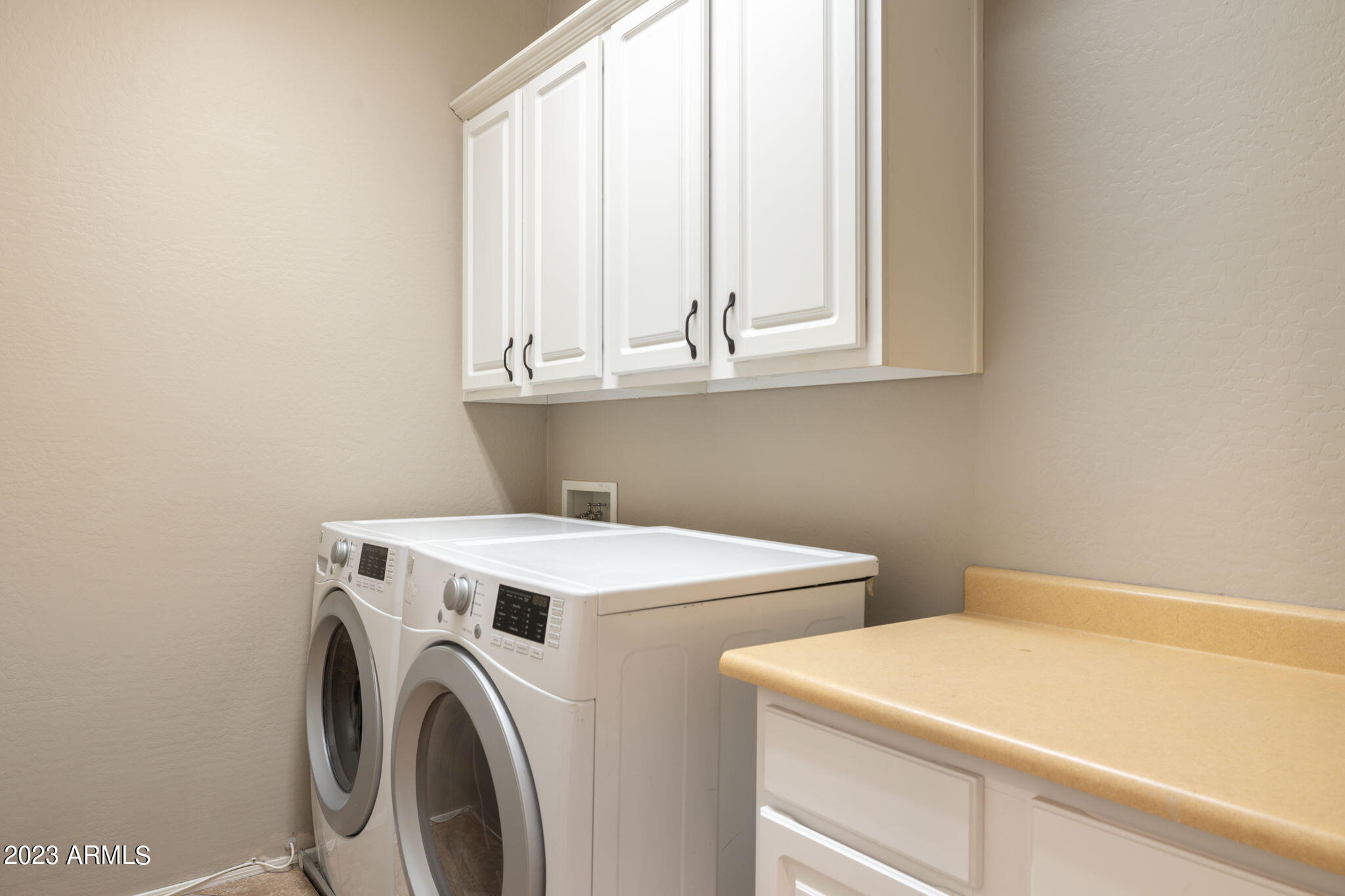 3338 West Hemingway Lane Phoenix, AZ 85086 - Photo 40 of 48 a utility room with dryer and washer