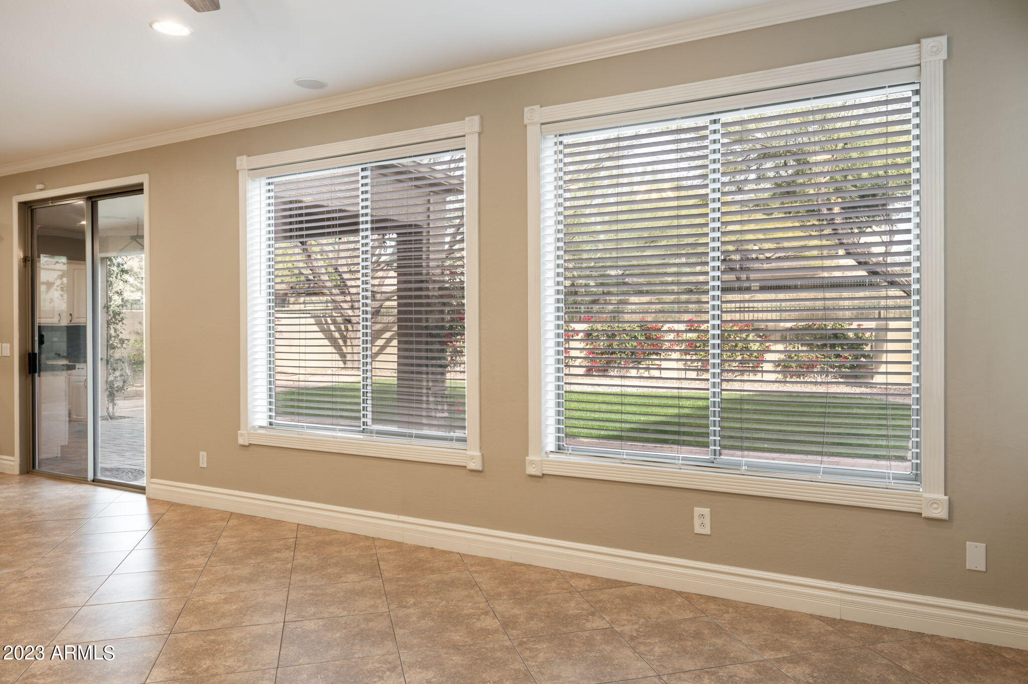 3338 West Hemingway Lane Phoenix, AZ 85086 - Photo 9 of 48 a view of an empty room with a window