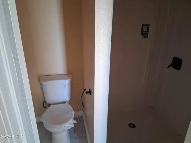 a bathroom with a toilet