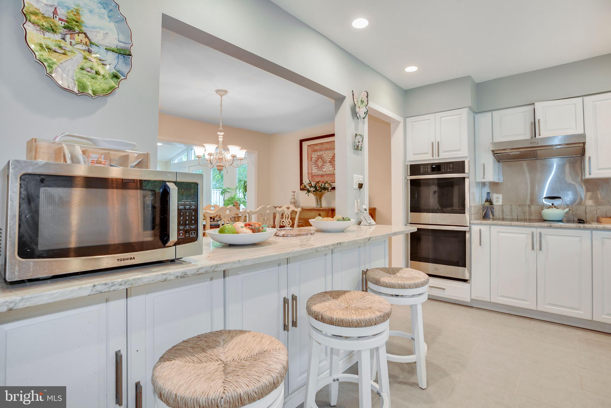 11486 Links Drive Reston, VA 20190 - Photo 7 of 28 Kitchen bar opens to dining room