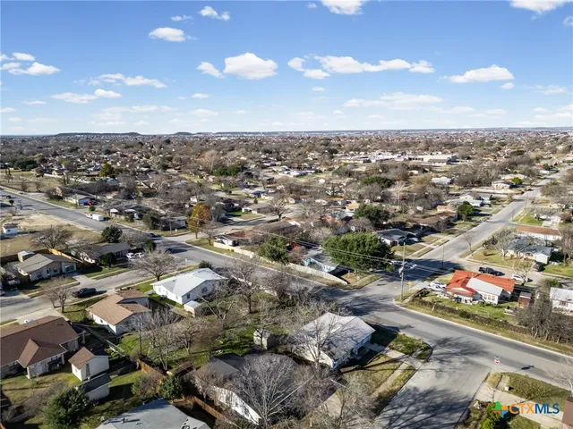 an aerial view of residential house with outdoor space