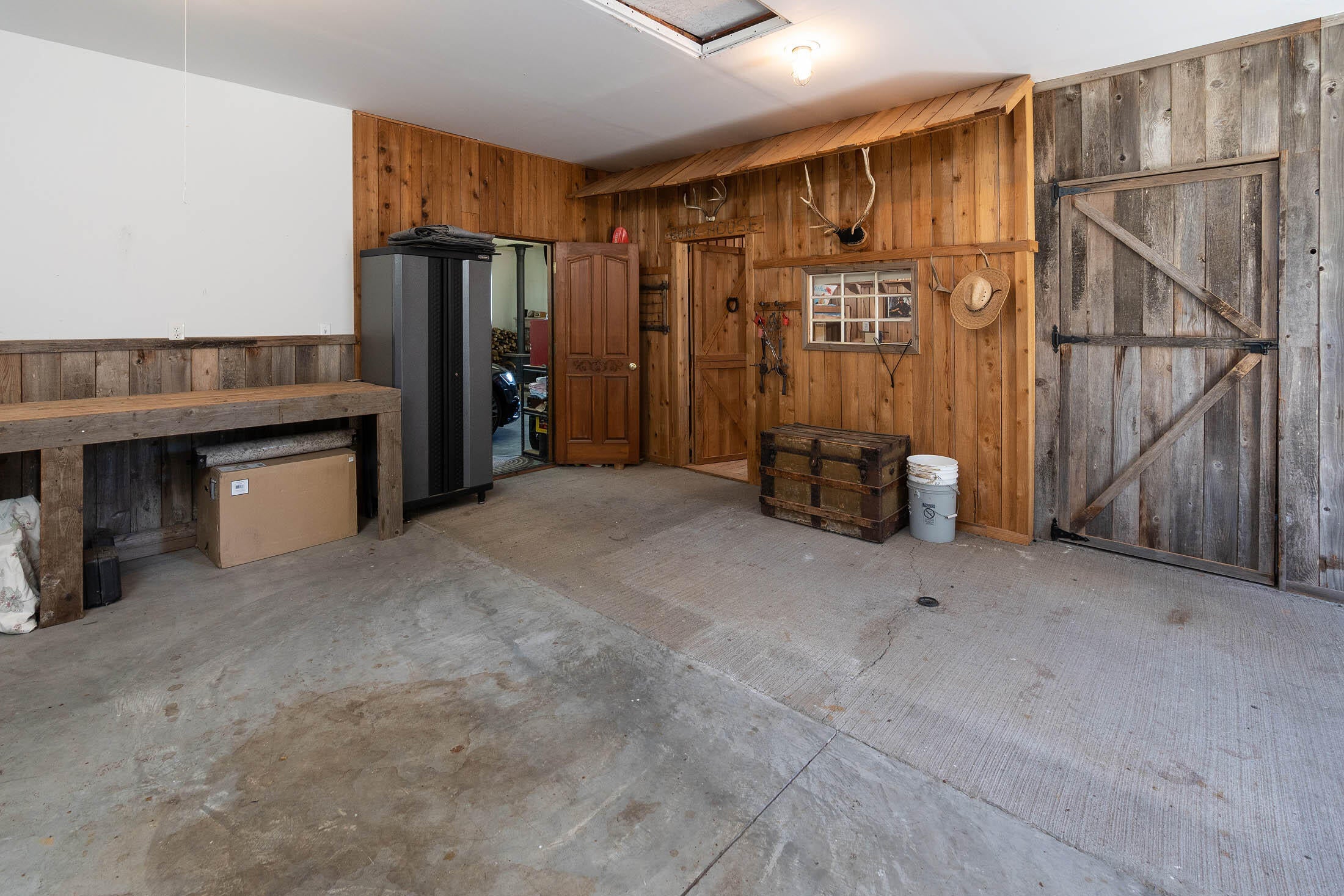 65111 Highland Road Bend, OR 97703 - Photo 29 of 37 Shop area of garage w/Tac rm