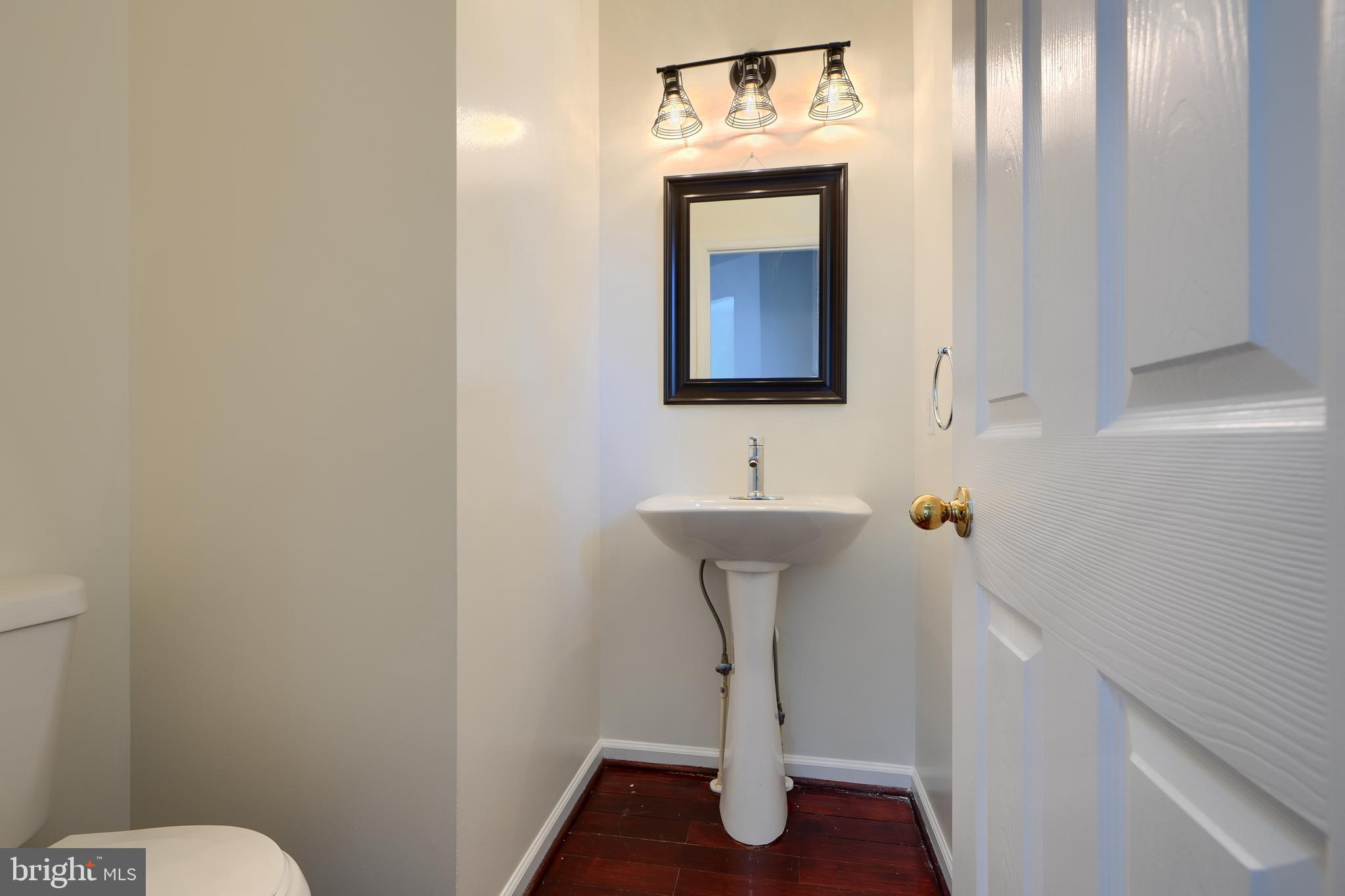 724 Tinker Road Middle River, MD 21220 - Photo 18 of 68 a bathroom with a sink toilet