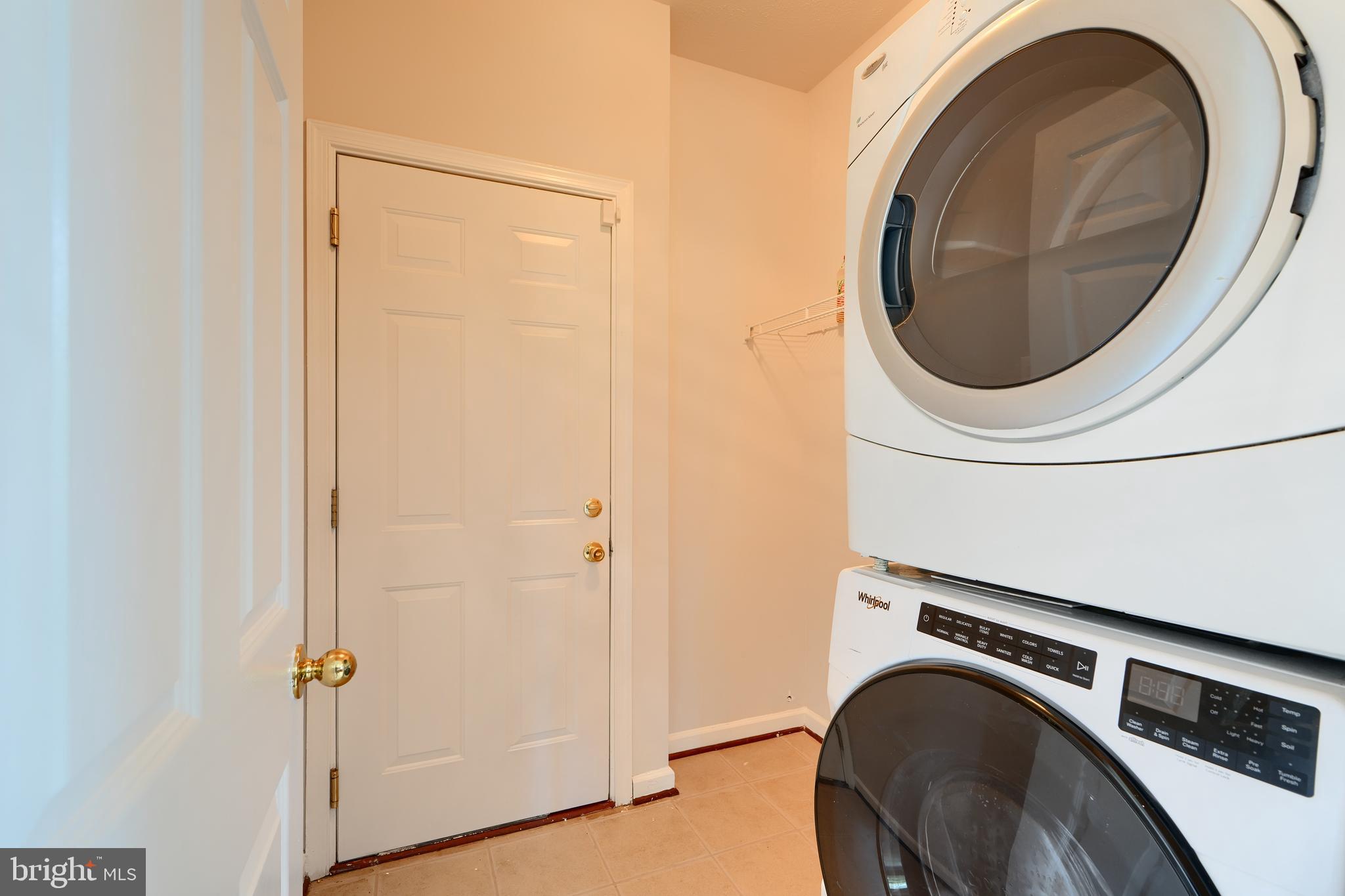 724 Tinker Road Middle River, MD 21220 - Photo 20 of 68 a utility room with dryer and washer