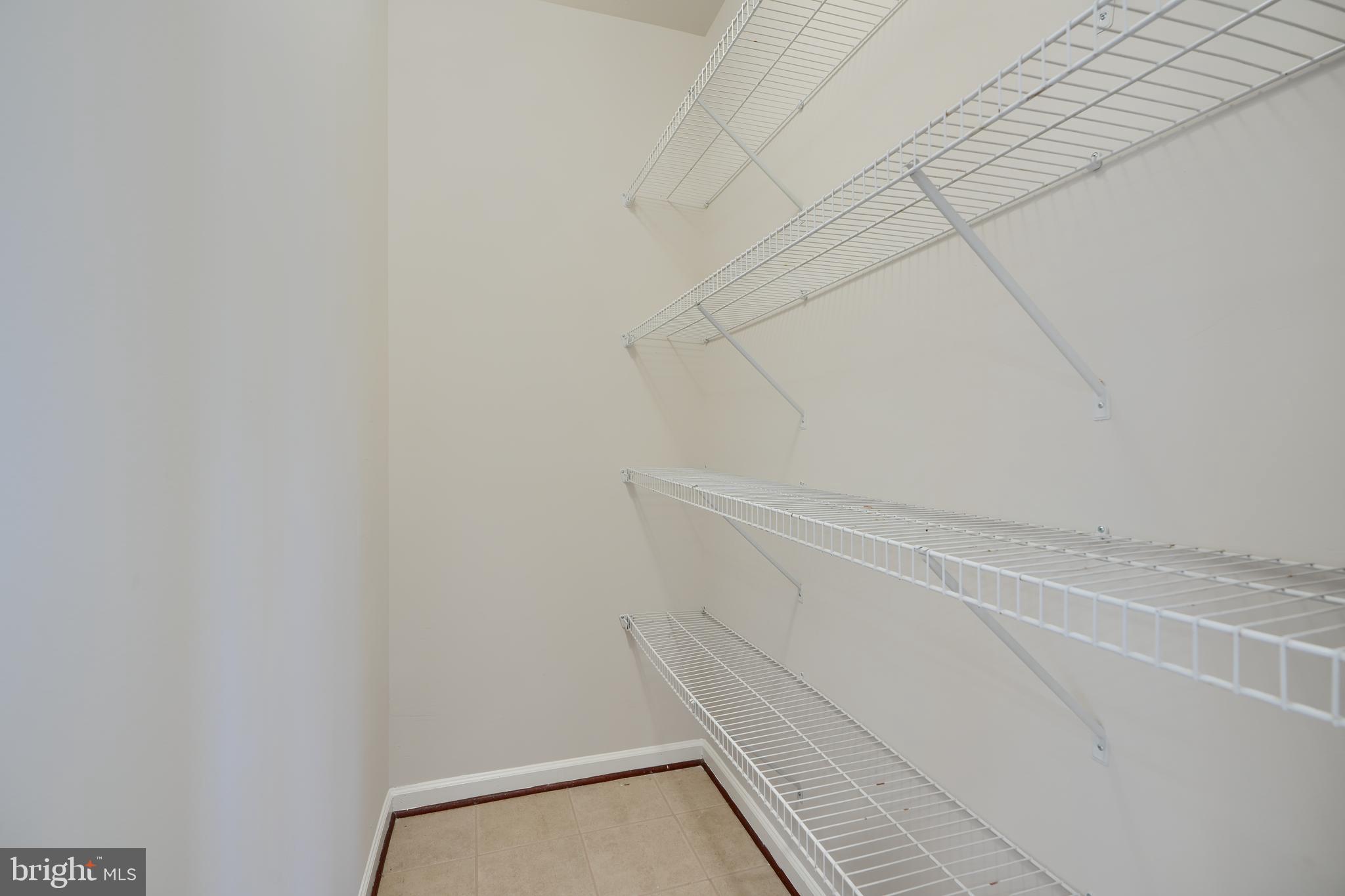 724 Tinker Road Middle River, MD 21220 - Photo 22 of 68 a view of a room with racks on the wall