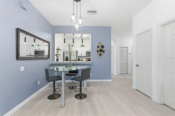 a view of a dining room with furniture