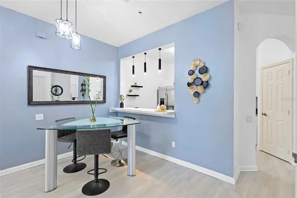 a view of a workspace with furniture