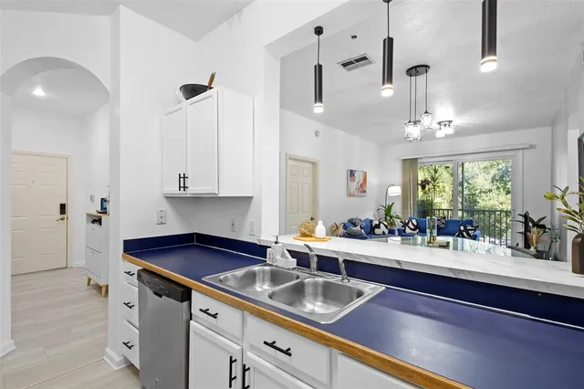 a bed room with a bed and a painting