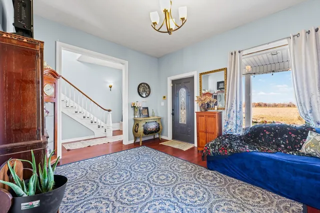 a view of an entryway with a workspace