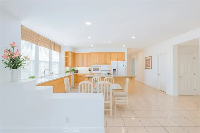 a view of a living room and kitchen