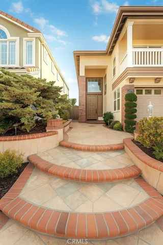 a view of a house with a swimming pool