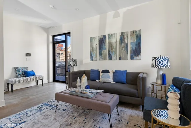 a living room with furniture and a couch