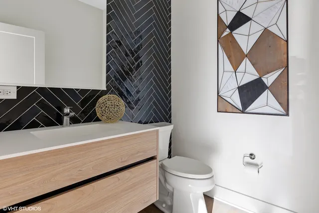 a bathroom with a sink and a toilet