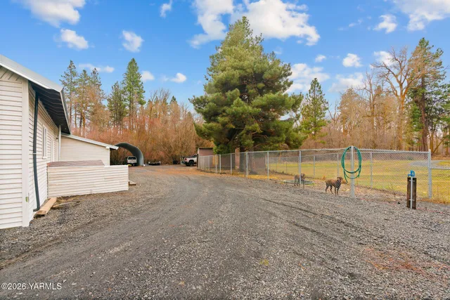 a view of a lake with a yard