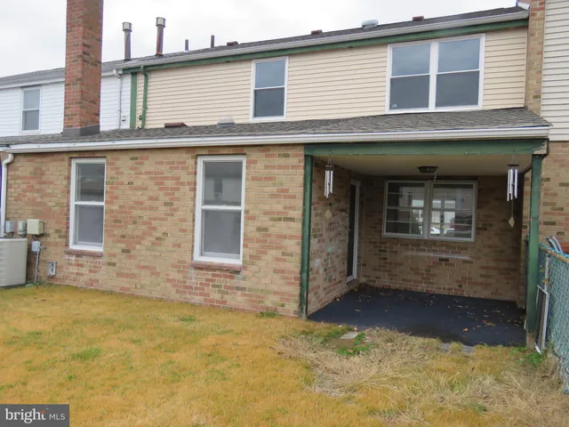 a front view of a house having yard