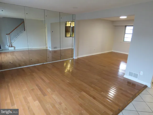 a view of an empty room and window