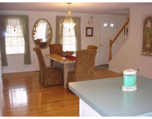 96 Mashapaug Road Sturbridge, MA 01566 - Photo 8 of 30 a view of a dining room with furniture and a large window