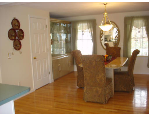 96 Mashapaug Road Sturbridge, MA 01566 - Photo 9 of 30 a view of dining room and windows