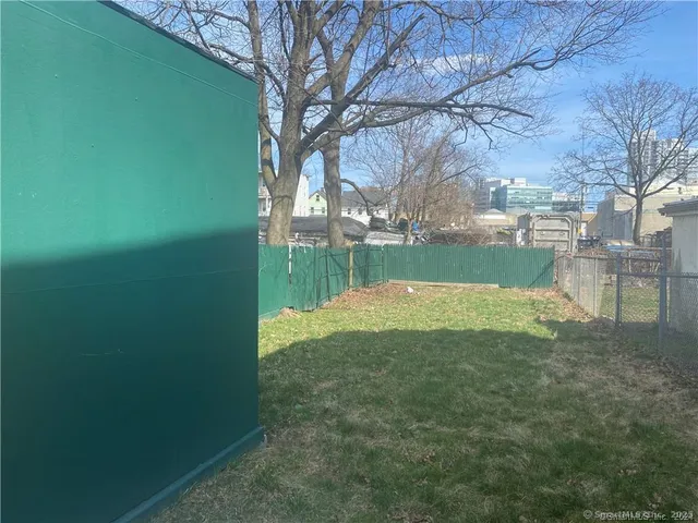 a view of swimming pool with outdoor seating