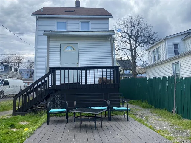 a view of front door and deck