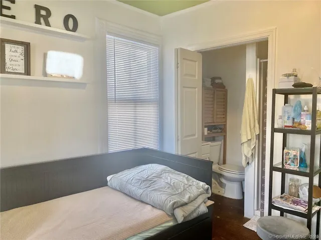 a bathroom with a toilet and a sink