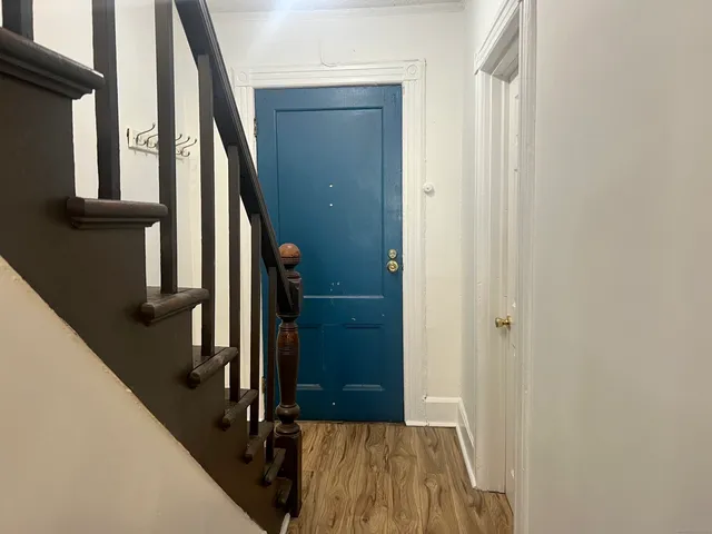 a kitchen with stainless steel appliances a stove a sink and a refrigerator