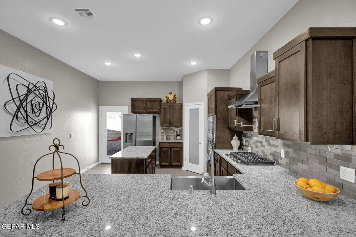 15113 Conviction El Paso, TX 79938 - Photo 14 of 42 a view of a room with gym equipment