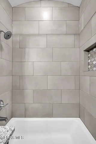 a bathroom with a bathtub