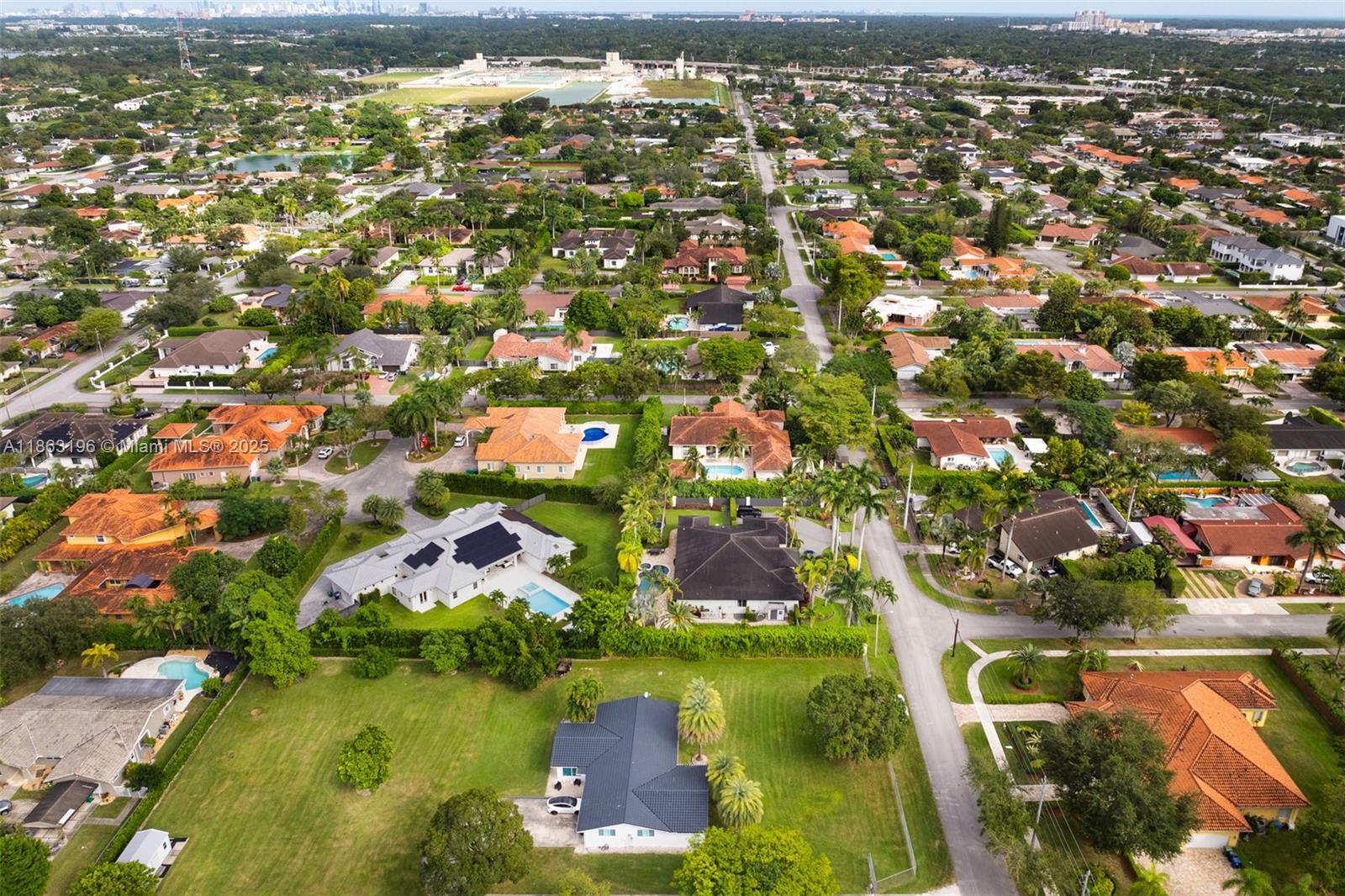9445 Southwest 68th Street Miami, FL 33173 - Photo 41 of 41 an aerial view of residential houses with outdoor space