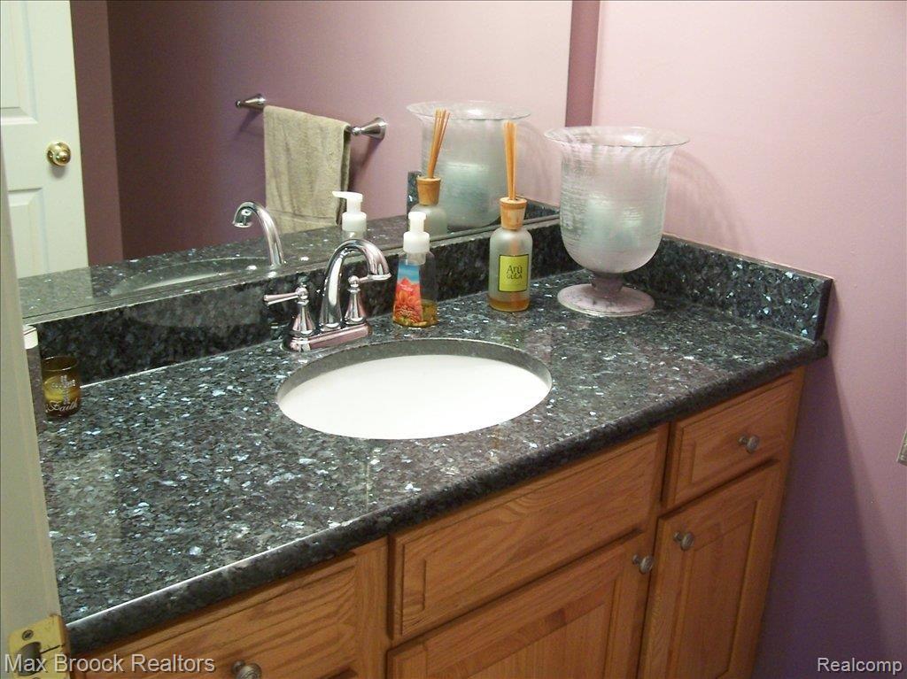 713 Elmwood Court Rochester, MI 48307 - Photo 11 of 21 Granite Countertop/ Half Bath
