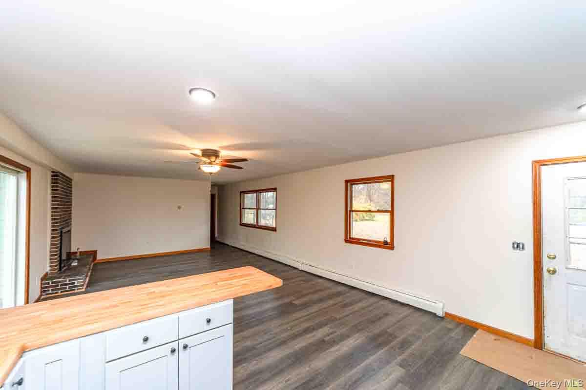 132 Red Top Road Wallkill, NY 12589 - Photo 19 of 19 wooden floor in an empty room with a window