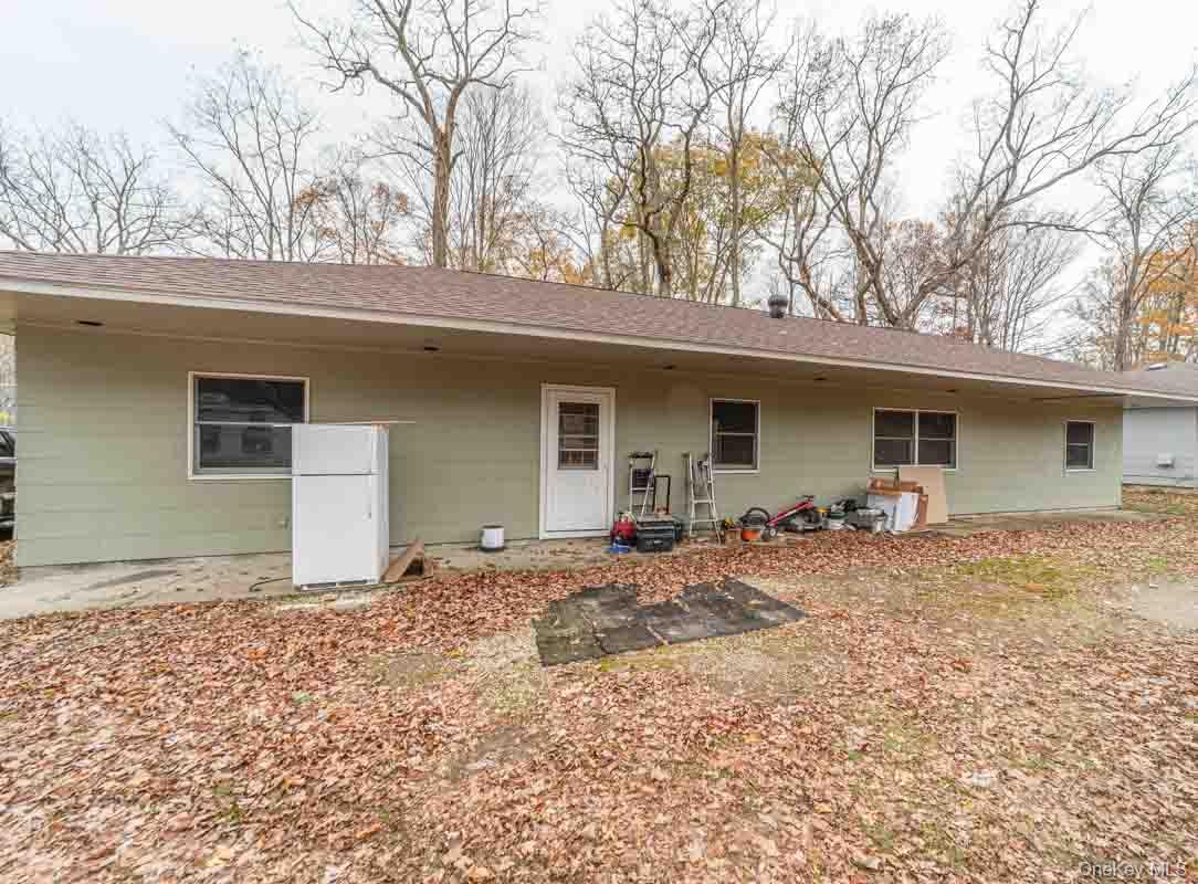 132 Red Top Road Wallkill, NY 12589 - Photo 17 of 19 front view of a house with a yard