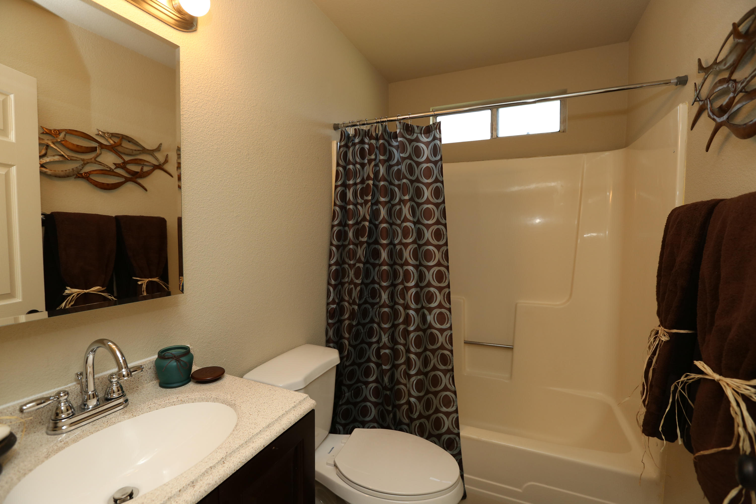 4521 Cedars Road Redding, CA 96001 - Photo 7 of 13 a bathroom with a sink toilet and shower