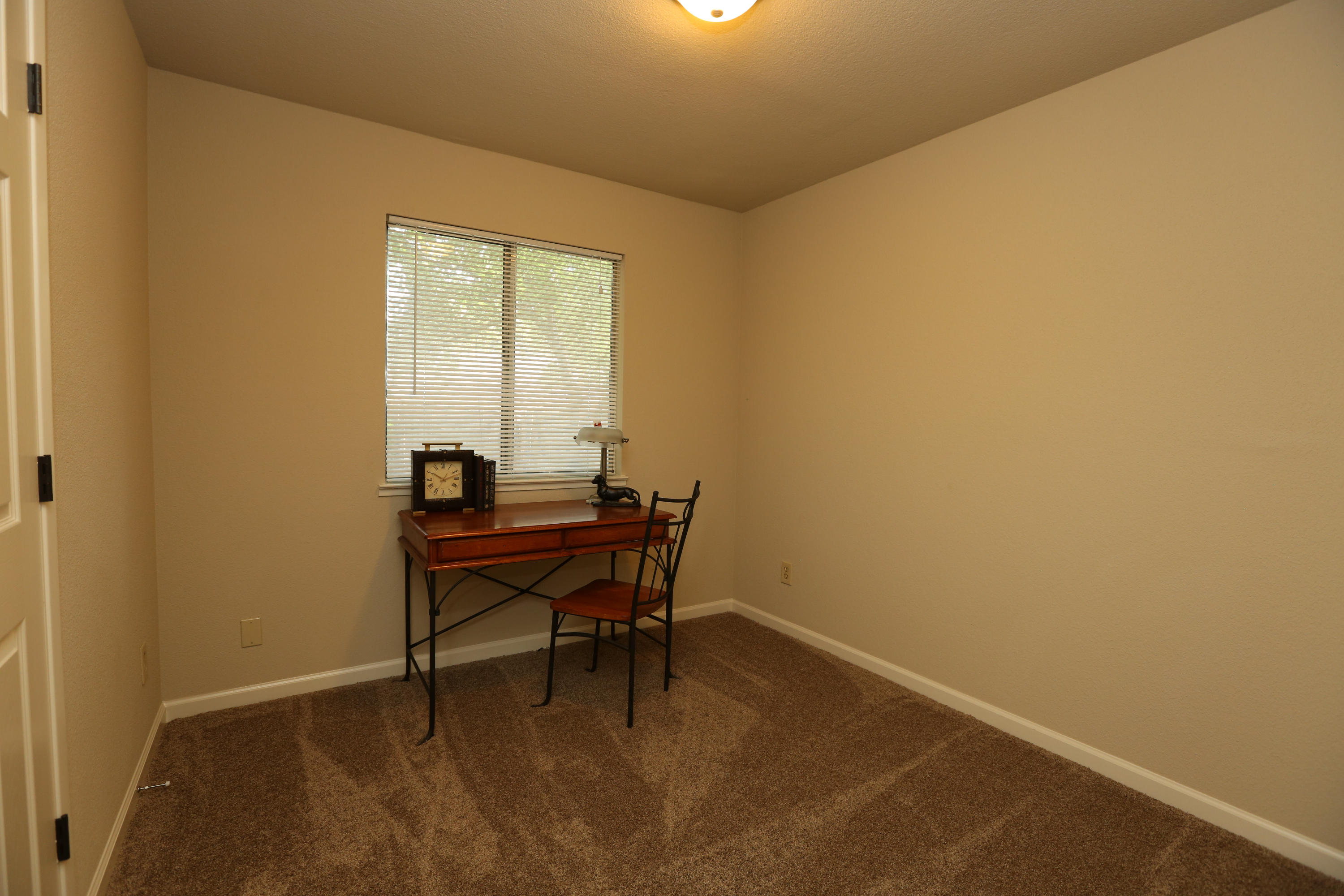 4521 Cedars Road Redding, CA 96001 - Photo 9 of 13 a view of a workspace with a window